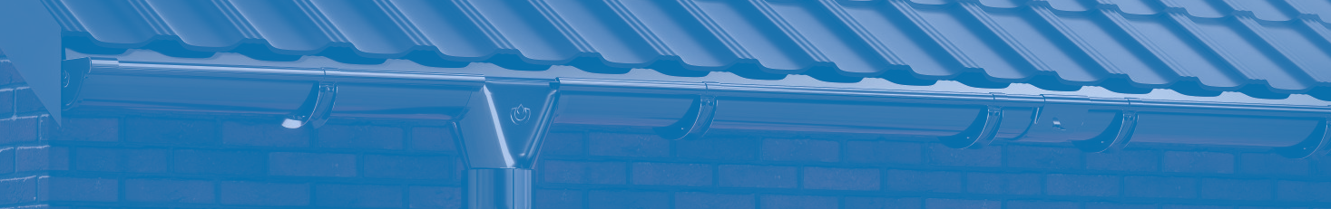 A round downspout is a component of gutter systems used to direct rainwater collected by the gutters away from the building's foundation. - CWB GUTTERS