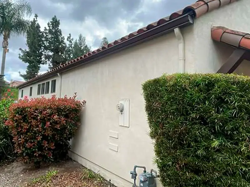 After installing the K-style gutters and Downspout in Brown and Almond
